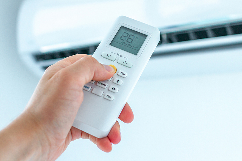 How Much Does it Cost to Install a Ductless Mini Split? A wall-mount mini-split heating and air conditioning unit installed in a new house. A modern heat pump, this unit heats a house in winter and cools in the summer. This type of system eliminates ductwork which is a primary source of inefficiency in a conventional system making this about 30% more efficient. This particular unit has an eye sensor which pans the room looking for hot or cold spots and directs the airflow accordingly.